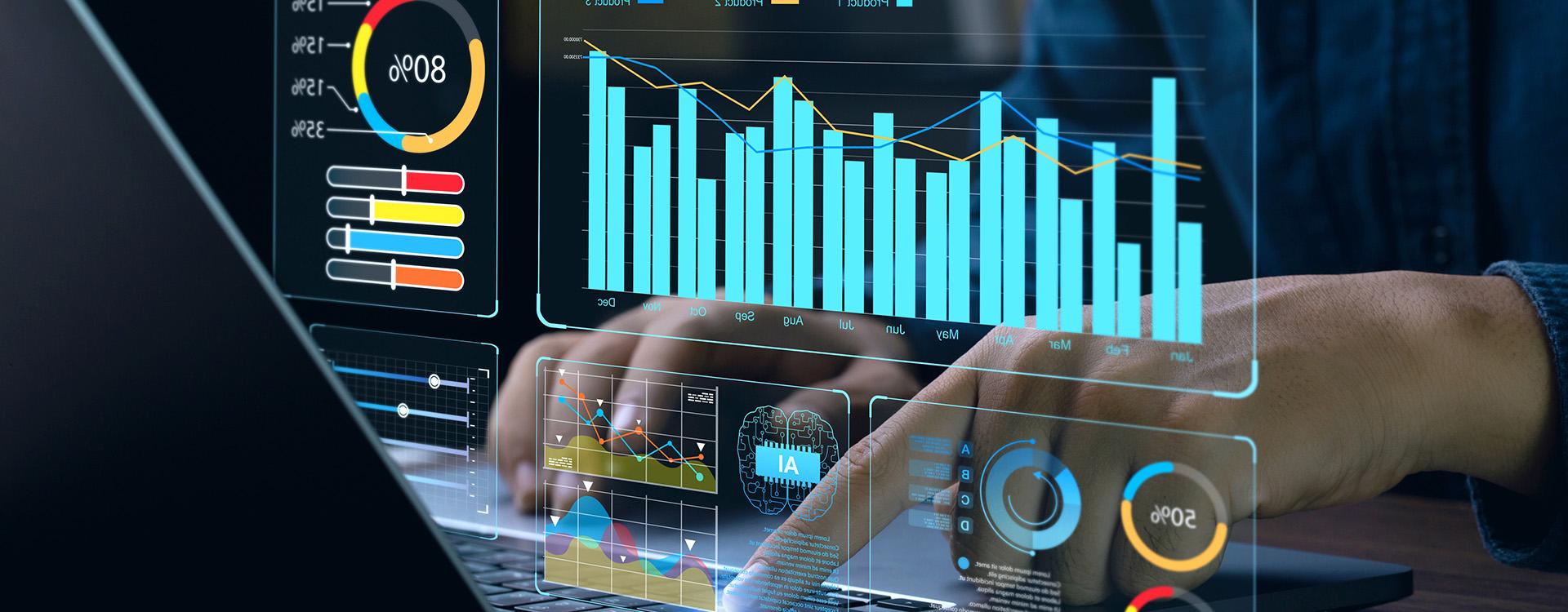 Image of analytics dashboard and office desk